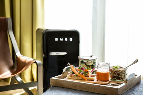 The hip Smeg refrigerators are stocked with healthy minibar options.