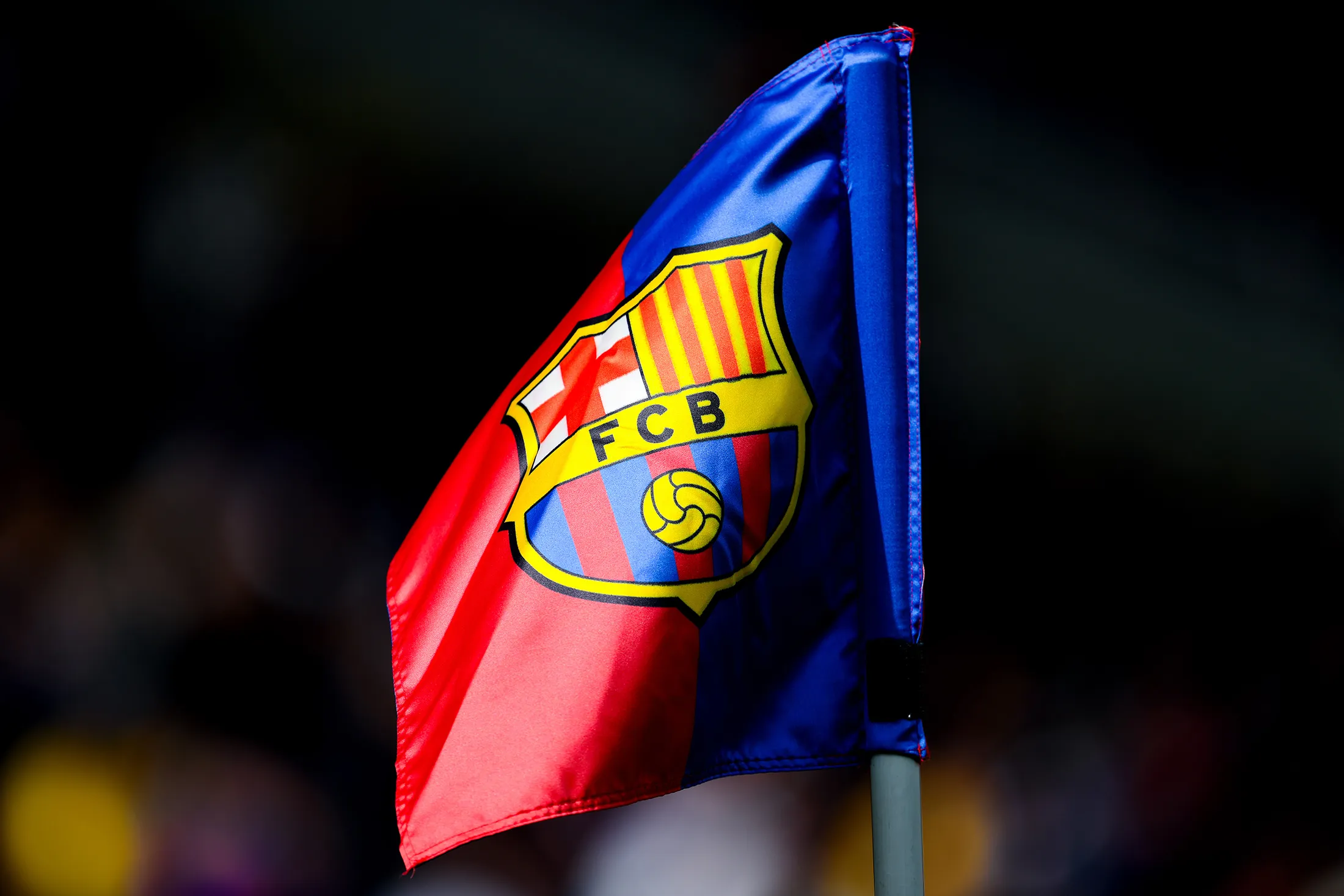 FC Barcelona badge sits on display in a corner flag&nbsp;at Estadi Olimpic Lluis Companys in Barcelona, Spain.