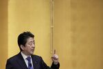 Shinzo Abe, Japan's prime minister, speaks at an event hosted by the Research Institute of Japan in Tokyo, Japan
