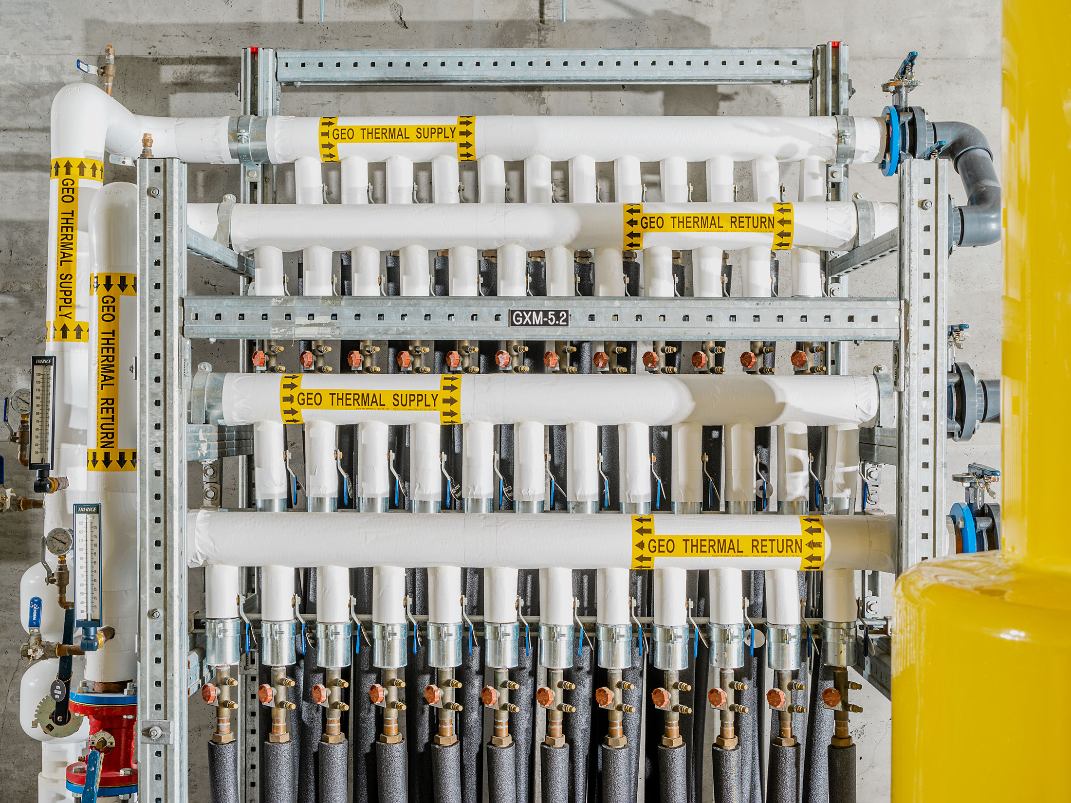 Geothermal heating and cooling system