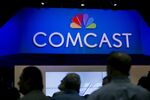 Comcast's deal to buy Time Warner Cable might prove beneficial to consumers. Photographer: Andrew Harrer/Bloomberg