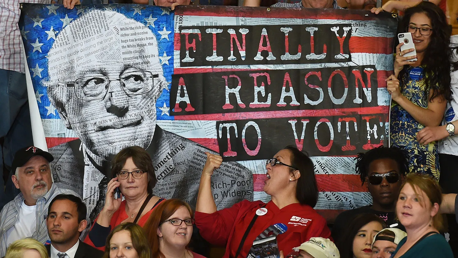 Supporters hold up a poster during a Bernie Sanders campaign rally at at Bonanza High School on Feb. 14, 2016, in Las Vegas.
