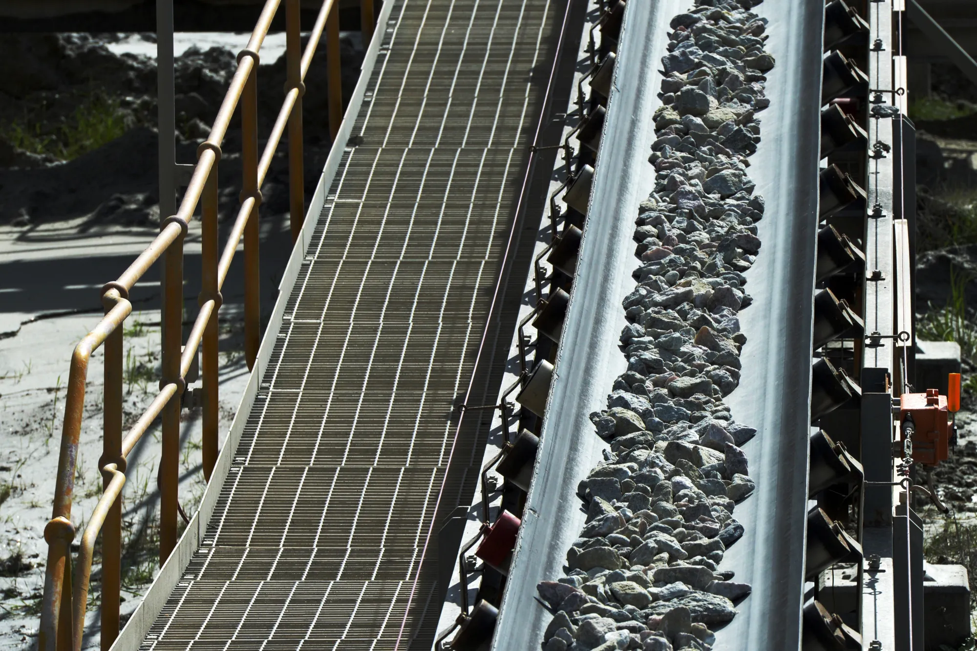 Lithium ore on a conveyor.