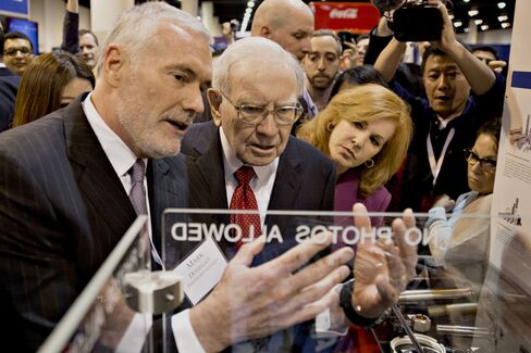 Buffett speaks with Donegan as they tour the exhibition floor during the Berkshire Hathaway Inc. annual shareholders meeting in Omaha, Nebraska this year.