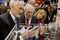 Buffett speaks with Donegan as they tour the exhibition floor during the Berkshire Hathaway Inc. annual shareholders meeting in Omaha, Nebraska this year.
