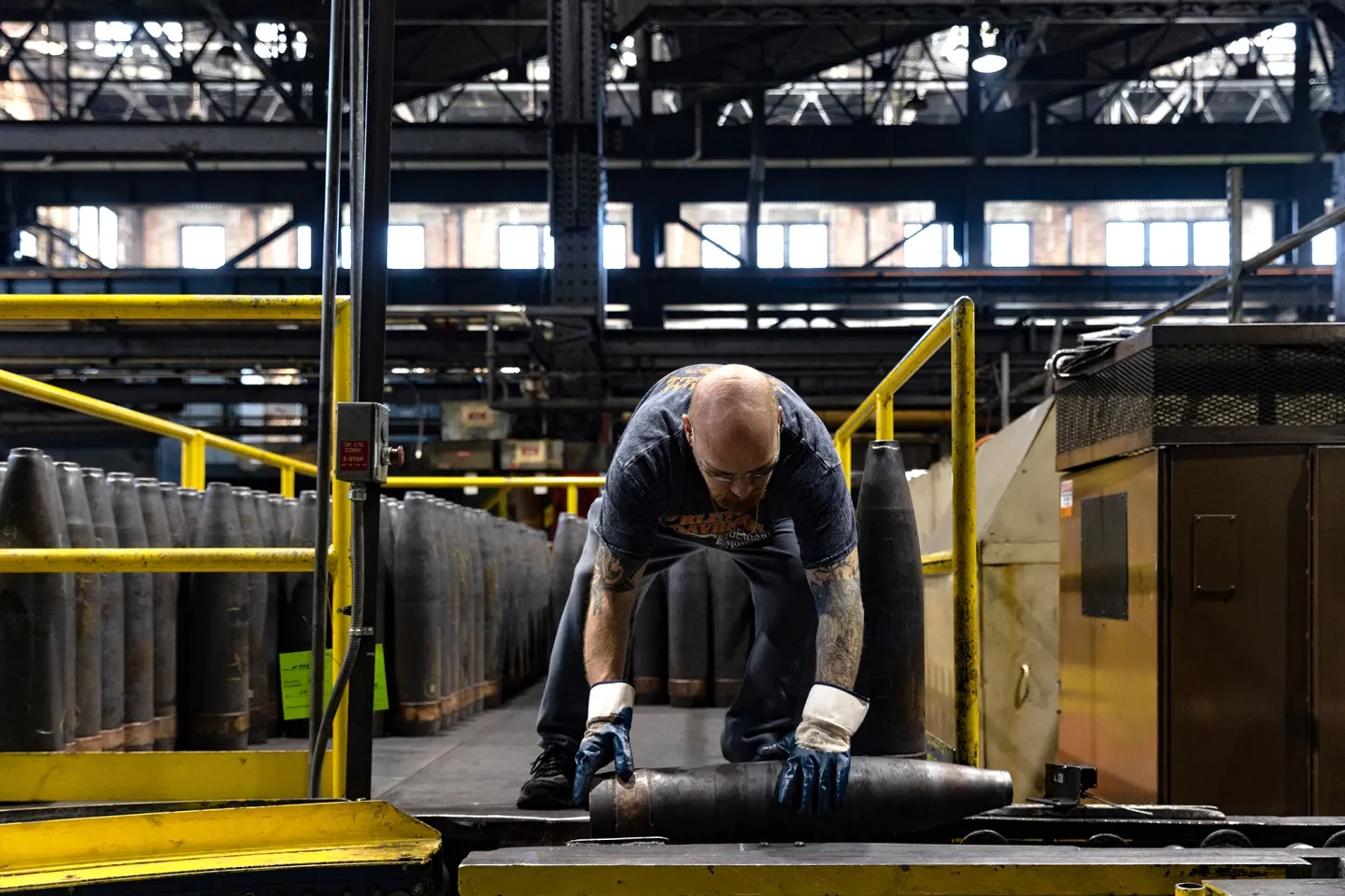 A worker moves 155mm artillery shells on the production shop at the Scranton Army Ammunition Plant&nbsp;in Scranton, Pennsylvania.&nbsp;