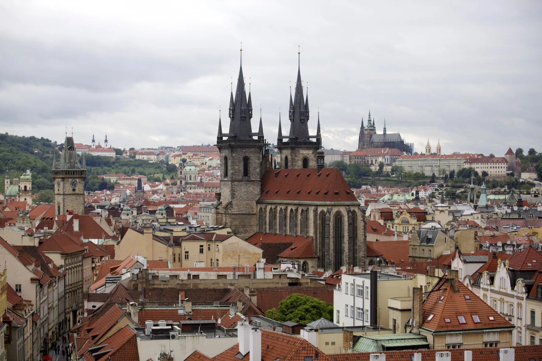 The church of Our Lady Before Tyn, center, and Prague cathedral, right, stand on the city skyline in Prague, Czech Republic, on Monday, May 27, 2013.