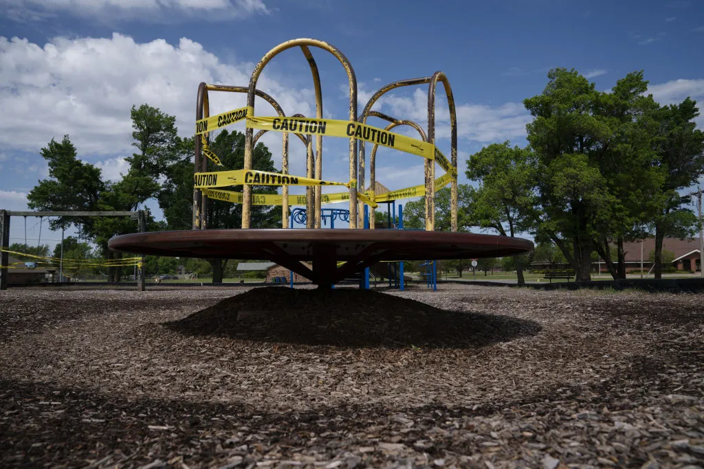 Kids can’t fall off the merry-go-round if it's closed.