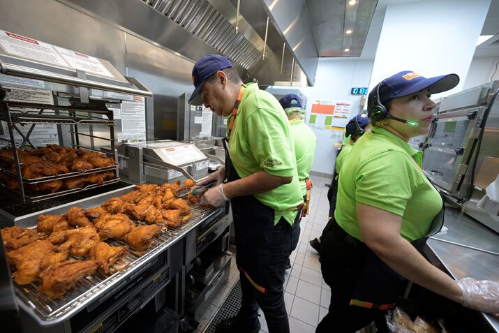 Fried Chicken Chain Cut Worker Steps by 9,000 a Day to Save Cash