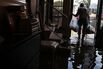 A resident of Bonita Springs, Fla., removes her belongings from her home on Sept. 12, 2017, after it was flooded by Hurricane Irma.