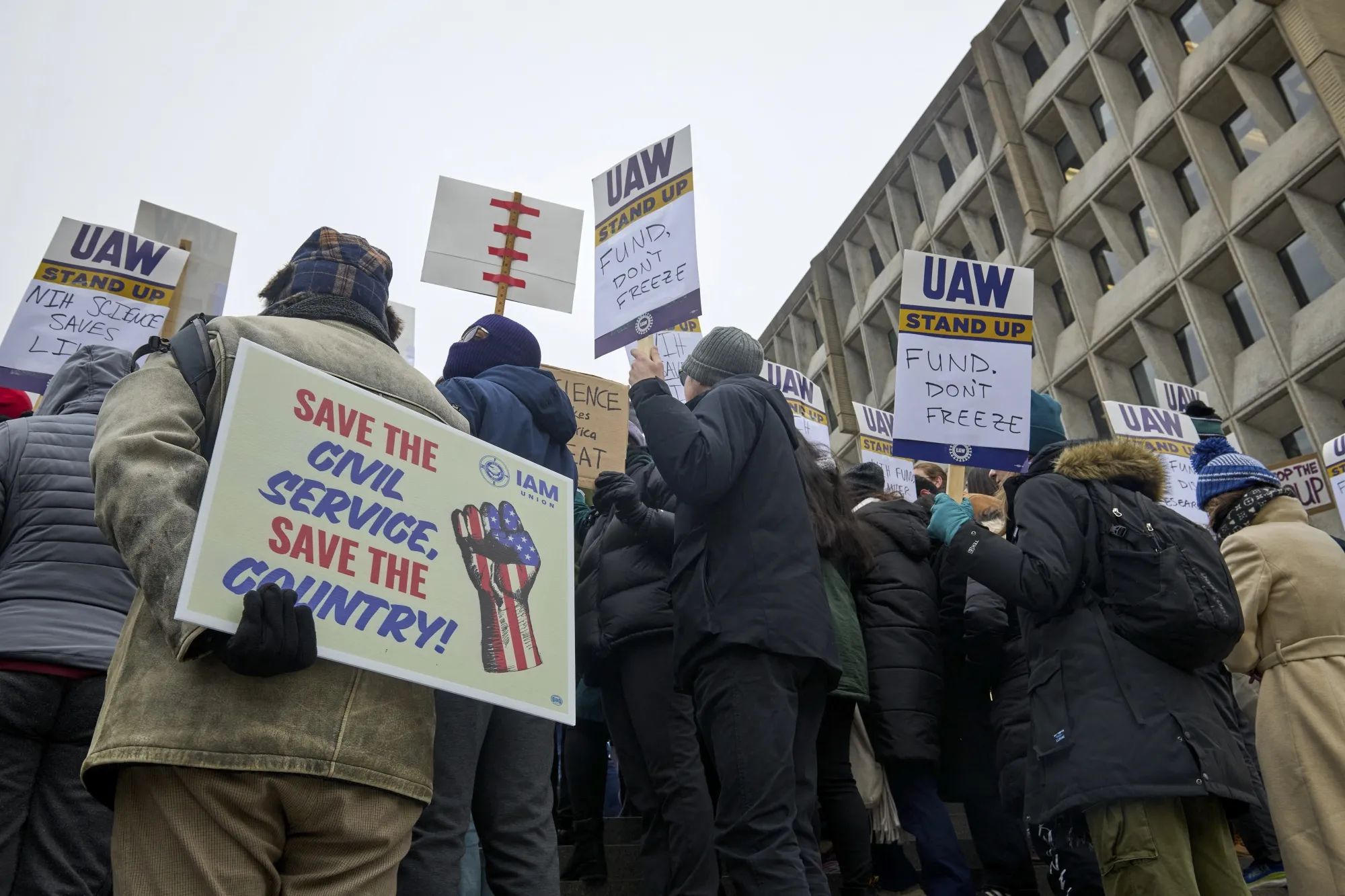 Former federal workers protest against Trump administration policies&nbsp;in Washington DC, on Feb. 19.