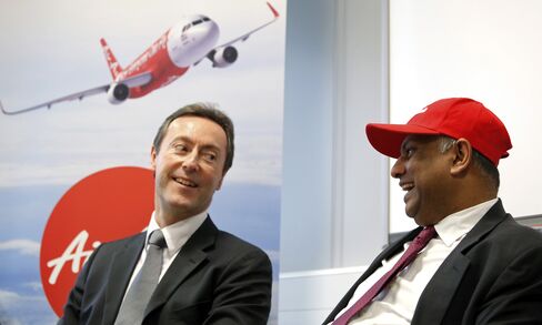 AirAsia Bhd. CEO Tony Fernandes and Airbus CEO Fabrice Bregier