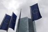 Flags of the European Union fly outside the European Central Bank headquarters in Frankfurt, Germany. 