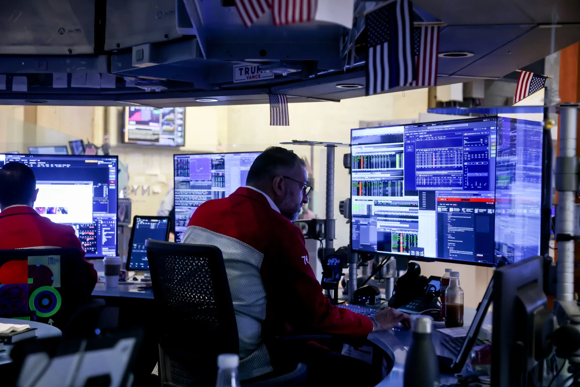 Traders work on the floor of the New York Stock Exchange.