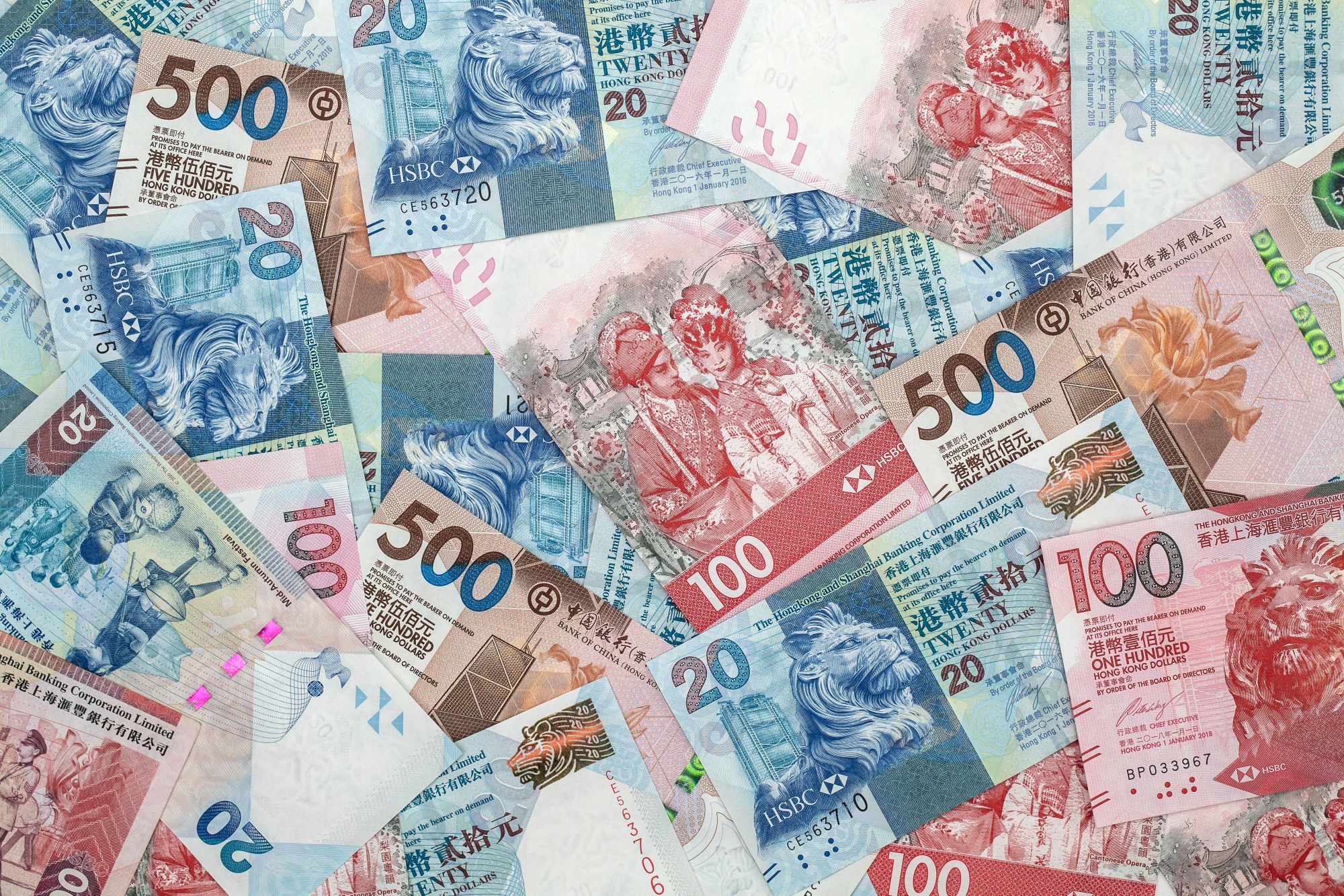 Hong Kong Dollar, Chinese Yuan and US Dollar Banknotes As Currency Peg Intervention From HKMA Continues Into Third Day