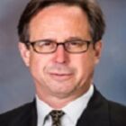 Headshot of Mark A Schlossberg