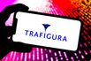 In this photo illustration, a Trafigura logo is displayed on