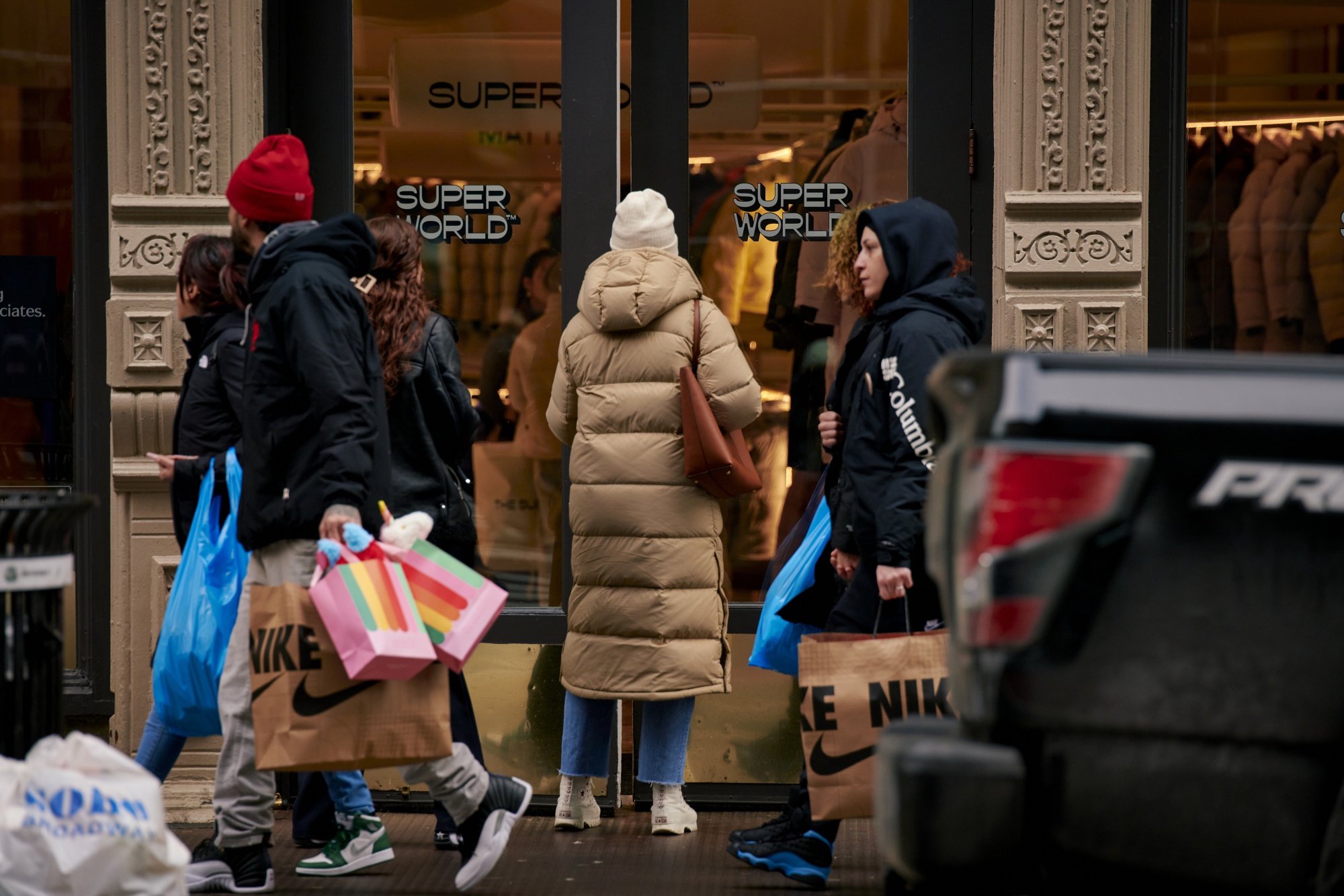 A shopper enters a&nbsp;store in the SoHo neighborhood of New York.