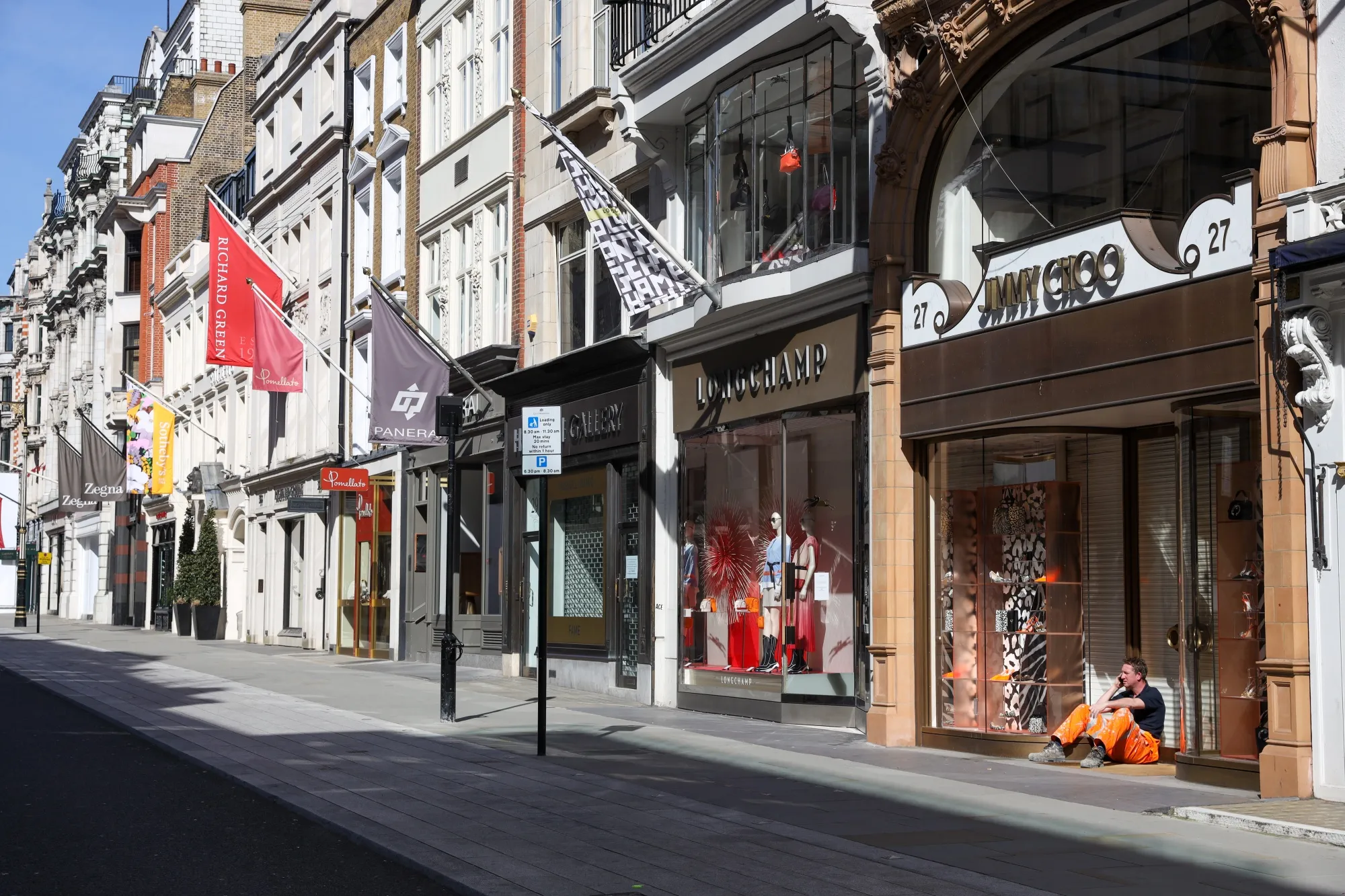 Closed goods stores stand on New Bond Street in London, U.K.