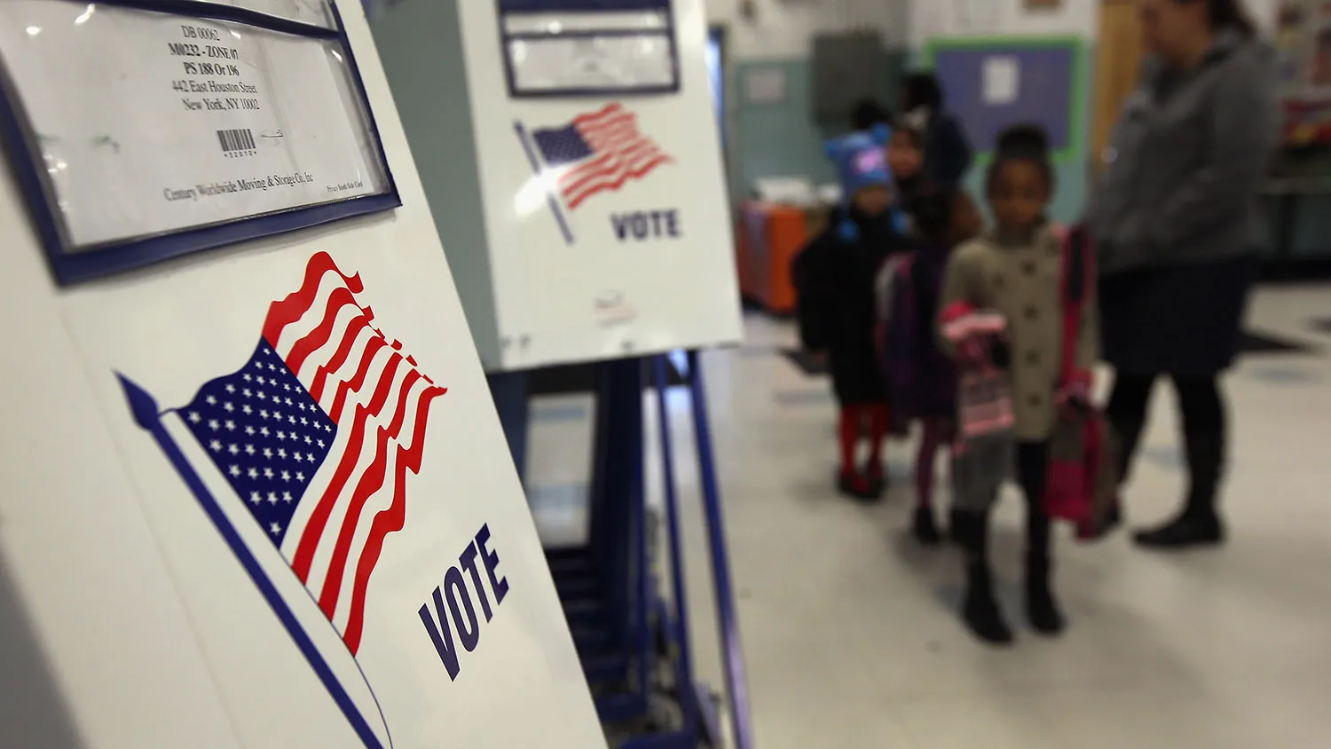 Voting booths stand at the ready as students return to school on Nov. 5, 2012, in New York City.
