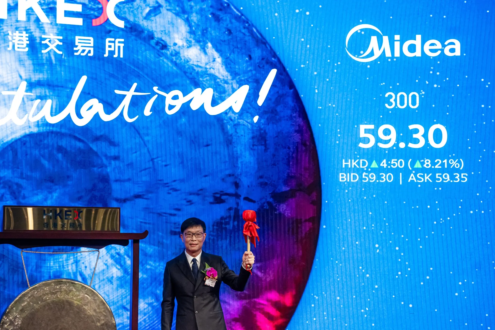 Midea Group's Fang Hongbo during the company's listing ceremony at the Hong Kong Stock Exchange on Sept. 17.