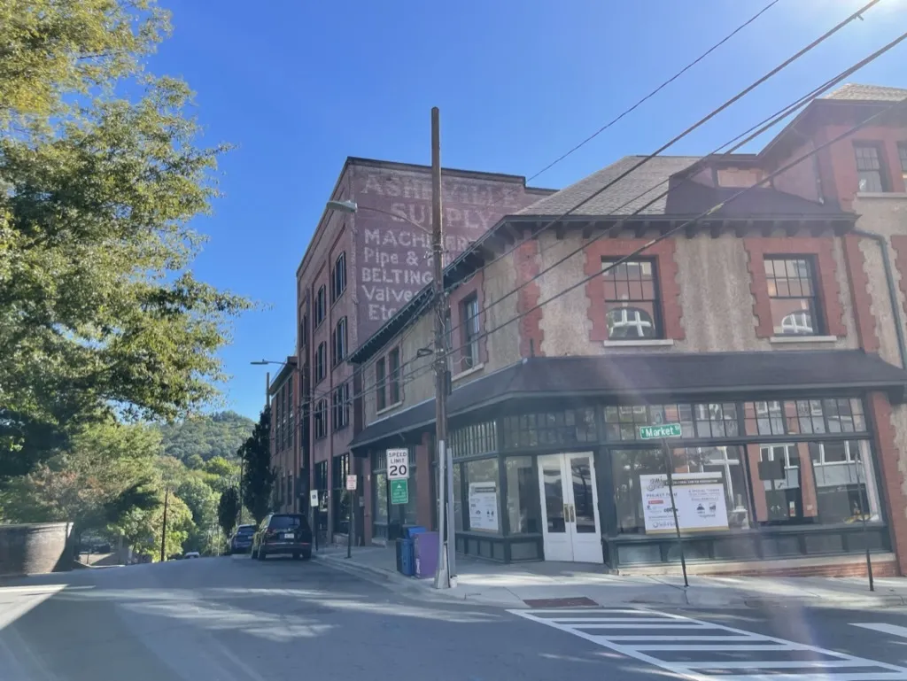 The intersection of Market and Eagle streets, where Black Asheville’s cultural and financial center once stood before it was razed during urban renewal policies.&nbsp;