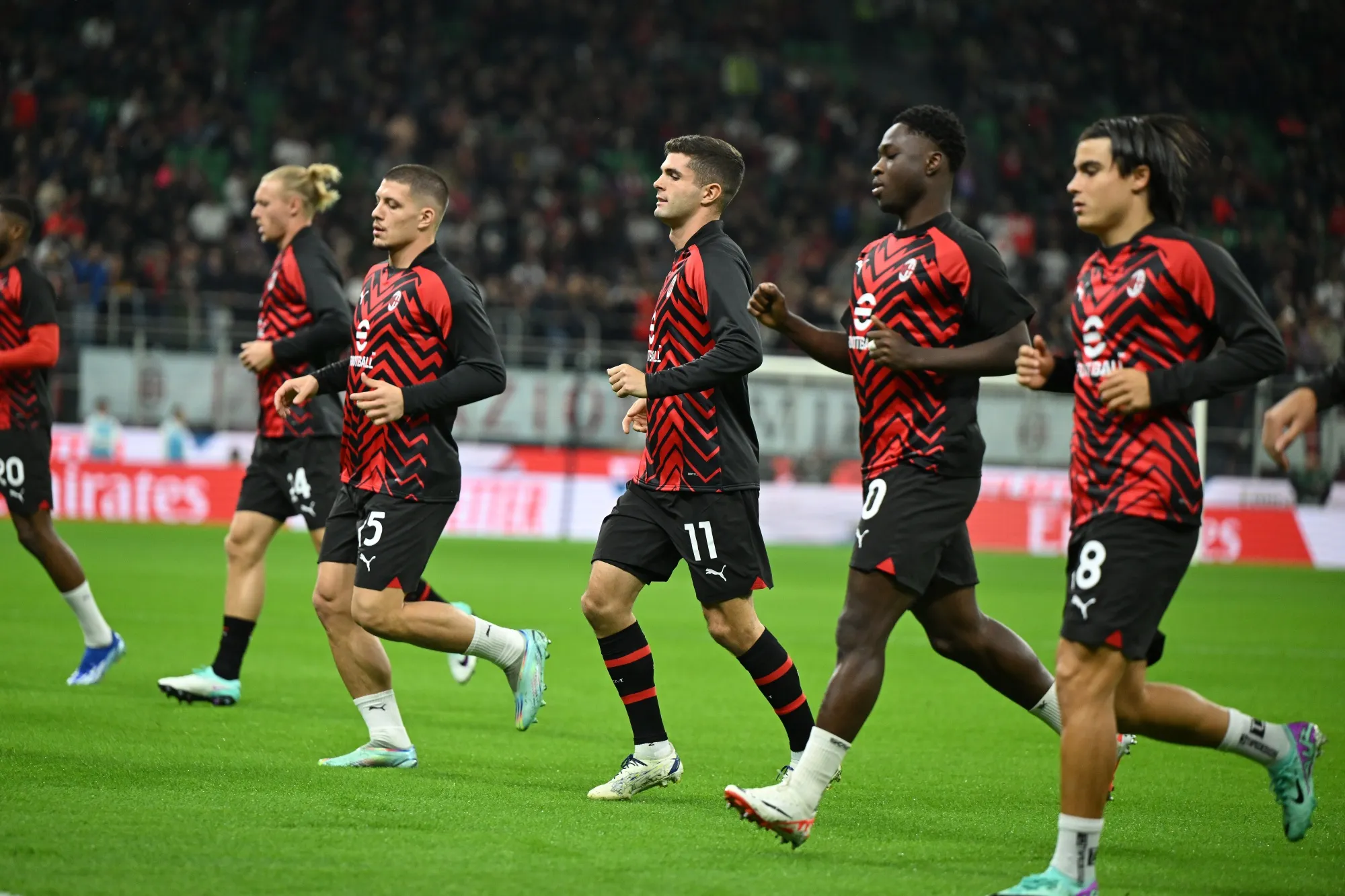 Players of AC Milan warm&nbsp;up ahead of a&nbsp;match between AC Milan and Juventus on October 22.