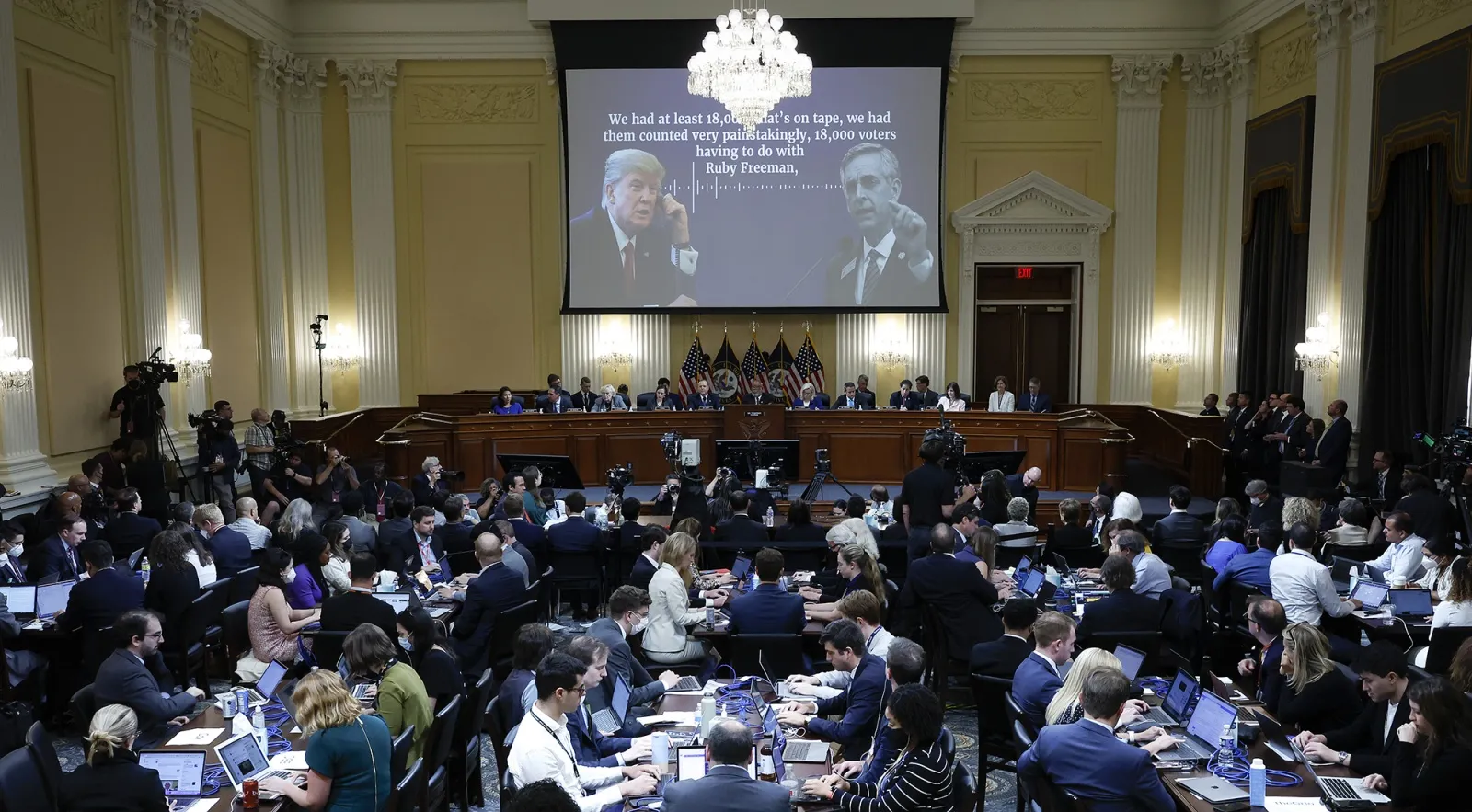 A transcript of a phone call between former U.S. President Donald Trump and Brad Raffensperger, Georgia's secretary of state, appears on a monitor during a hearing of the Select Committee to Investigate the January 6th Attack on the US Capitol in Washington, D.C.,&nbsp;on&nbsp;June 21.&nbsp;