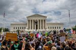 People protest in response to the Dobbs v Jackson Women's Health Organization ruling in front of the U.S. Supreme Court.