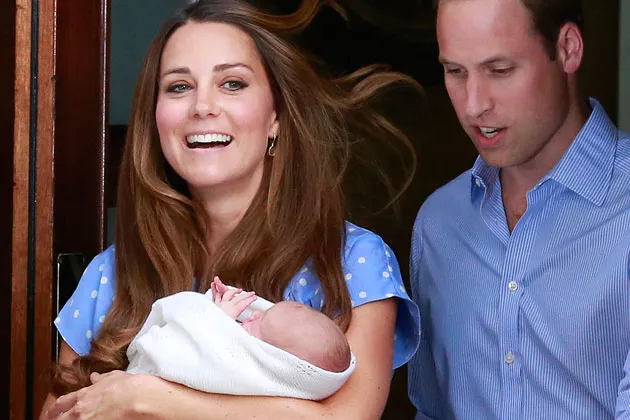 Britain’s Prince William and his wife, Catherine, Duchess of Cambridge, appear with their baby son outside St Mary's Hospital in London on July 23