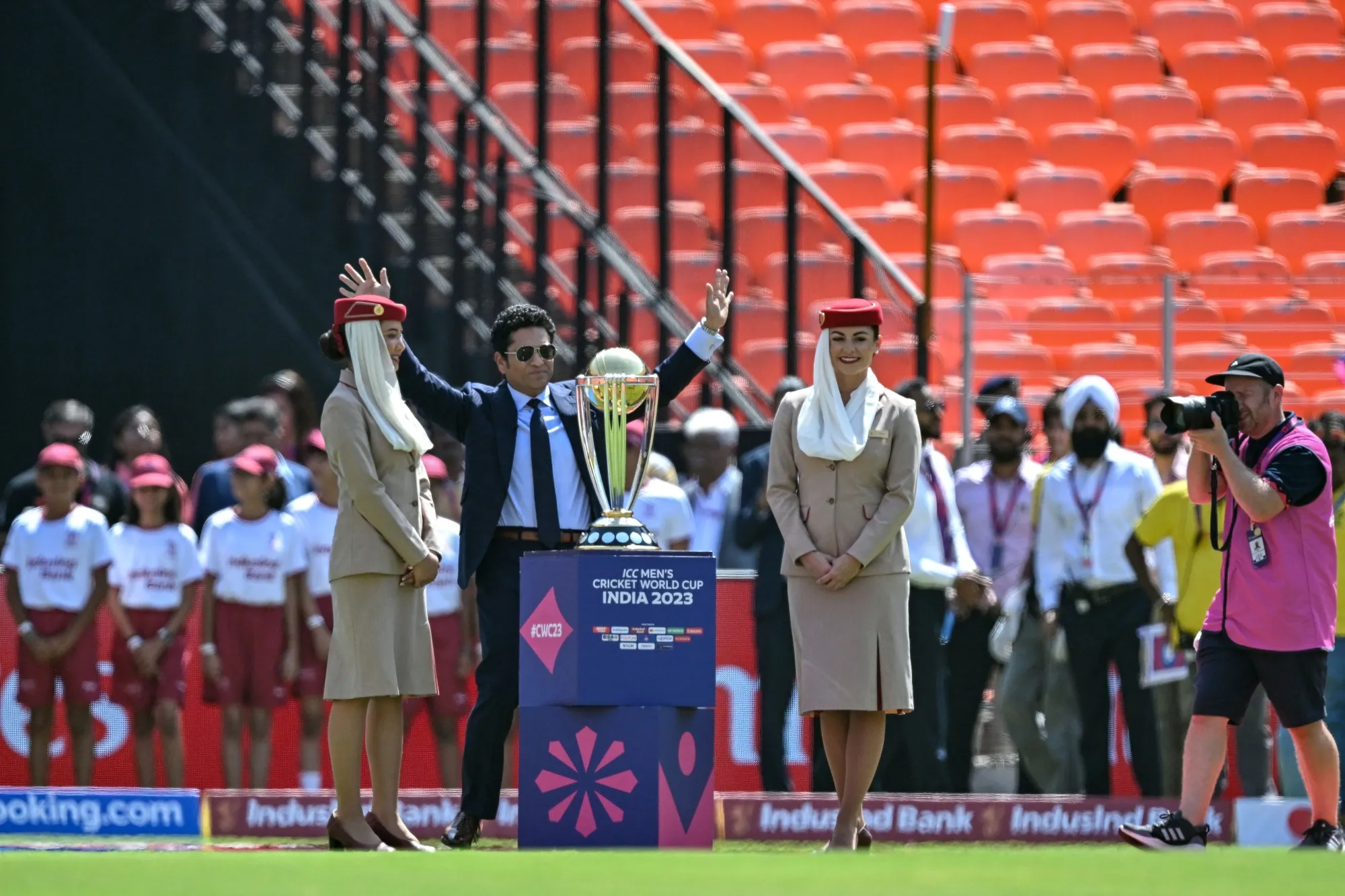 Cricket legend Sachin Tendulkar with the World Cup trophy before the start of the opening match in Ahmedabad on Oct. 5.