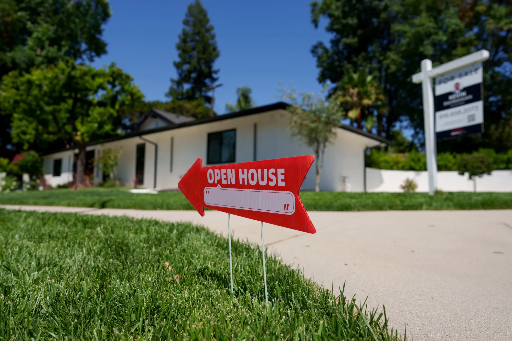 An "Open House" sign in front of a home for sale in Los Angeles.