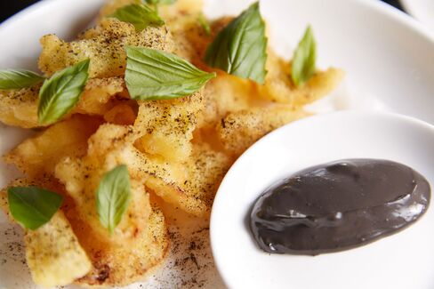 A wonderful dish of fried squid with ink-stained aioli.