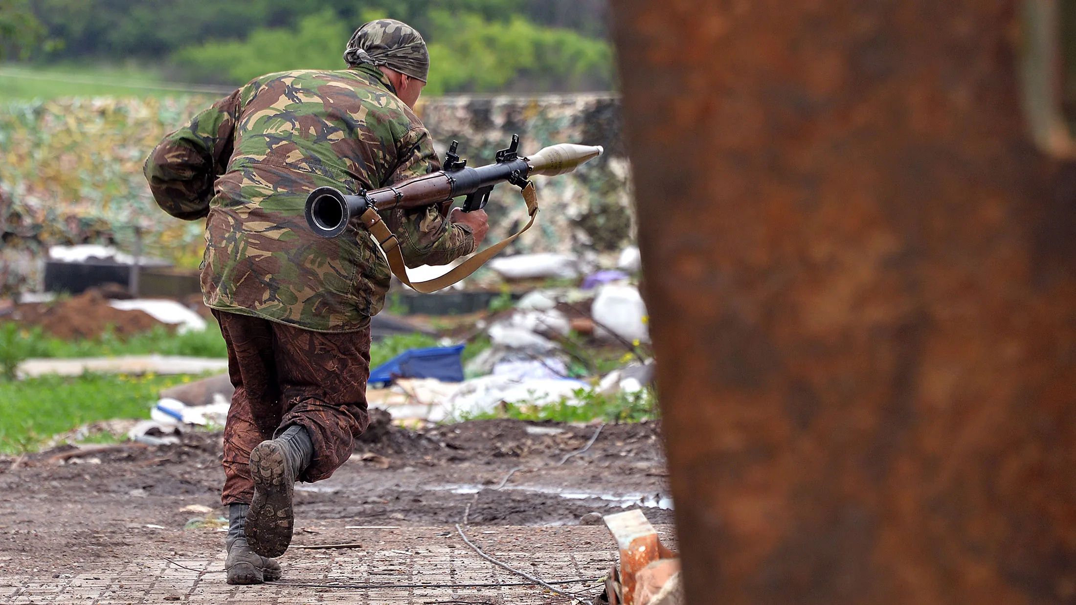 A Ukrainian serviceman prepares to fire a grenade launcher on positions on the frontline of fighting against pro-Russian separatists near Donetsk on May 30, 2015 in eastern Ukraine.

