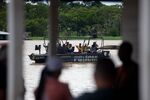 Police and firefighters leave to search for Bruno Pereira and Dom Phillips in Amazonas, Brazil, on June 11.