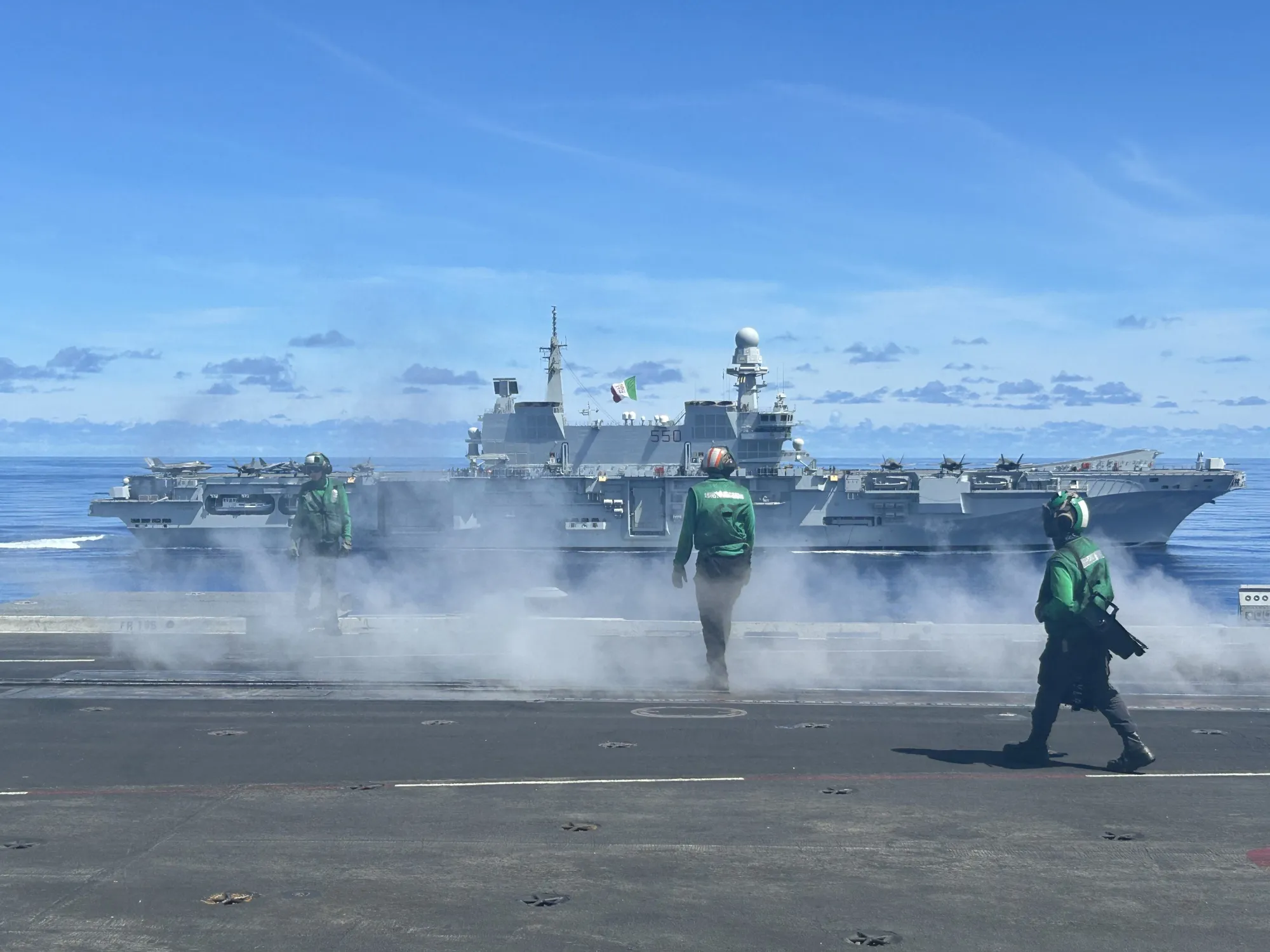 The Italian aircraft carrier Cavour, seen from the deck of the USS Abraham Lincoln, during joint training in the Philippine Sea on Aug. 9.