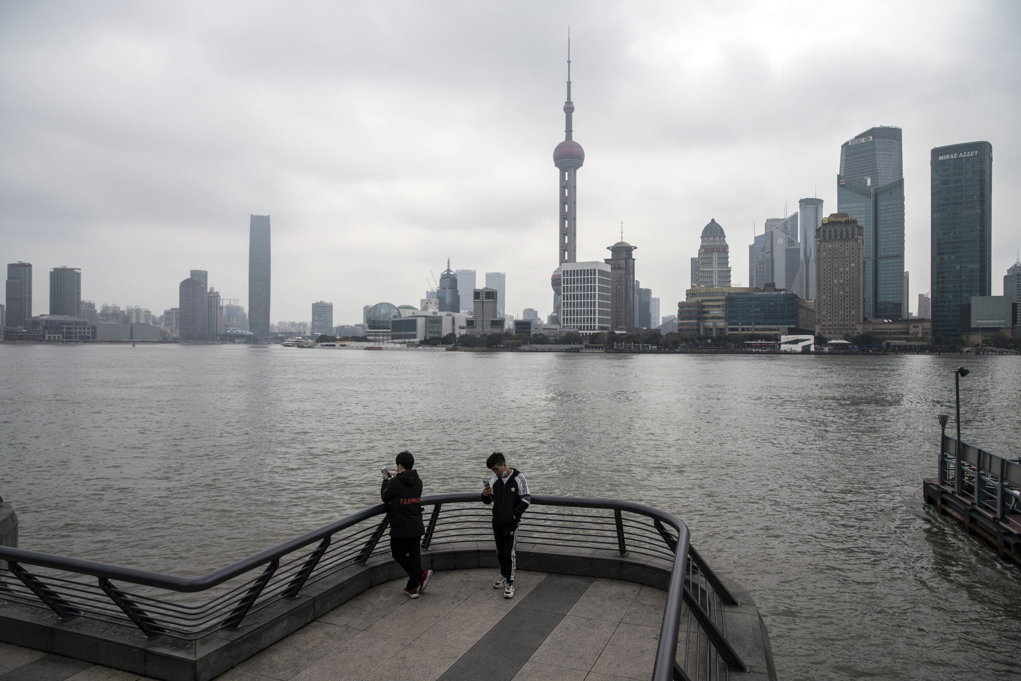 Shanghai on Feb. 12. UBS and Credit Suisse both have aggressive plans to expand on the mainland. 