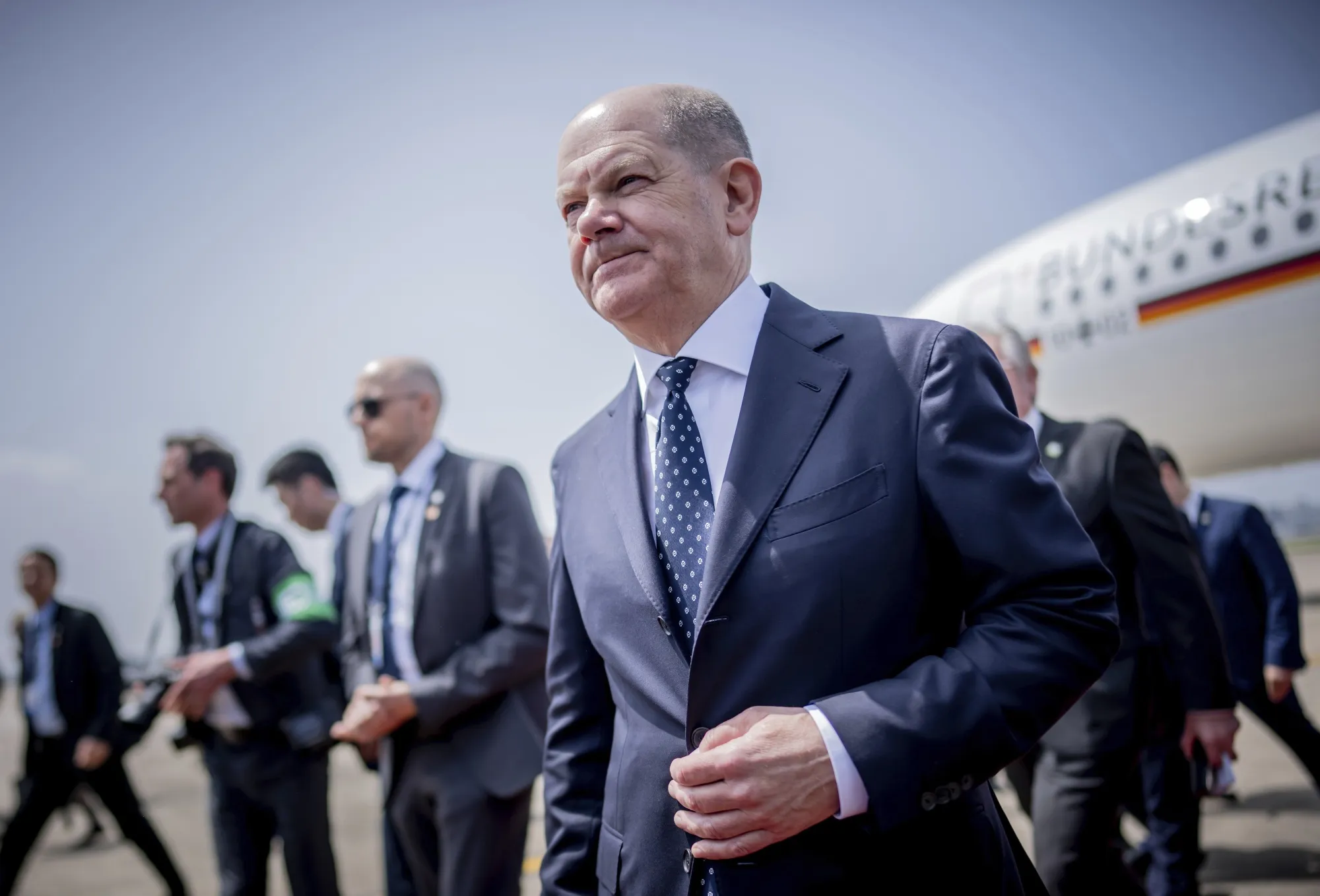 Olaf Scholz arrives at Shanghai airport on April 15.
