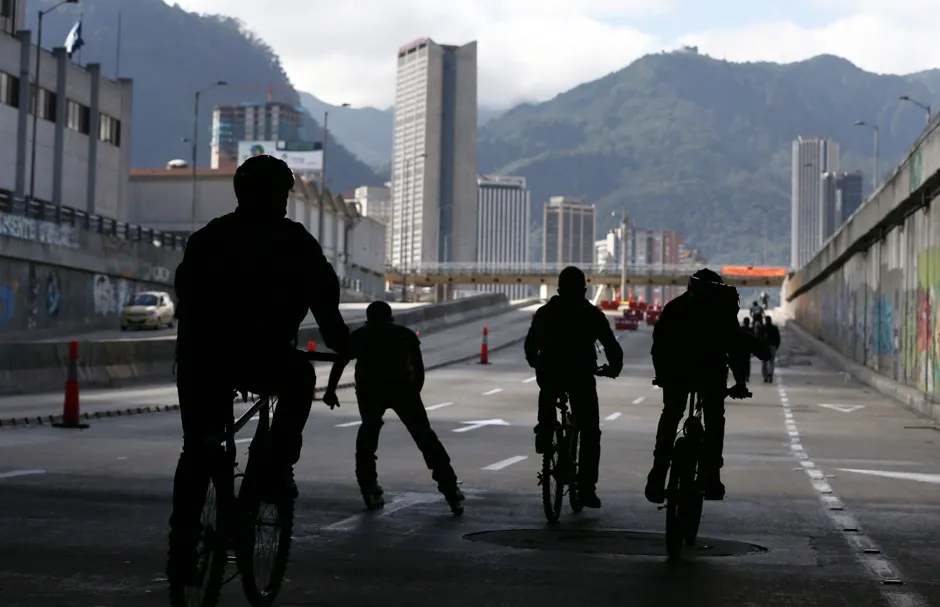 Commuters bike to their destinations on a "Day Without Cars and Motorcycle" in Bogota, Colombia.