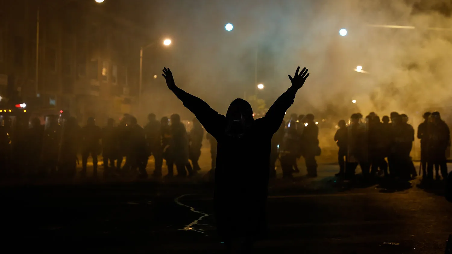 A protestor reacts during a curfew in Baltimore, Maryland, USA, 28 April 2015.
