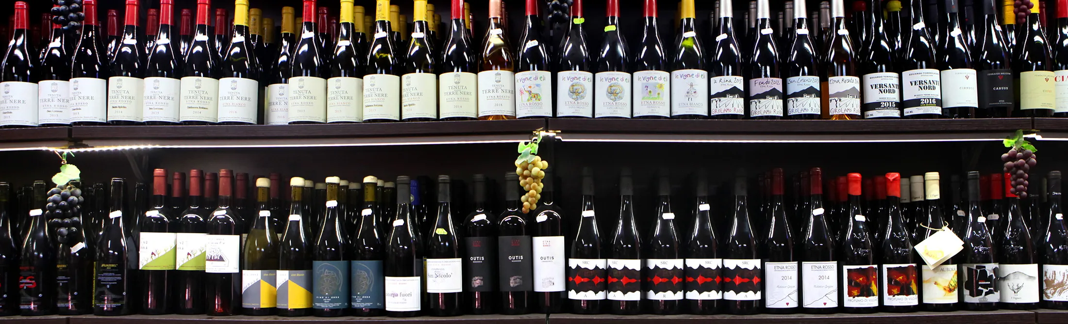 Shelves are filled with Sicilian wines at the Il Buongustaio dell'Etna wine bar.