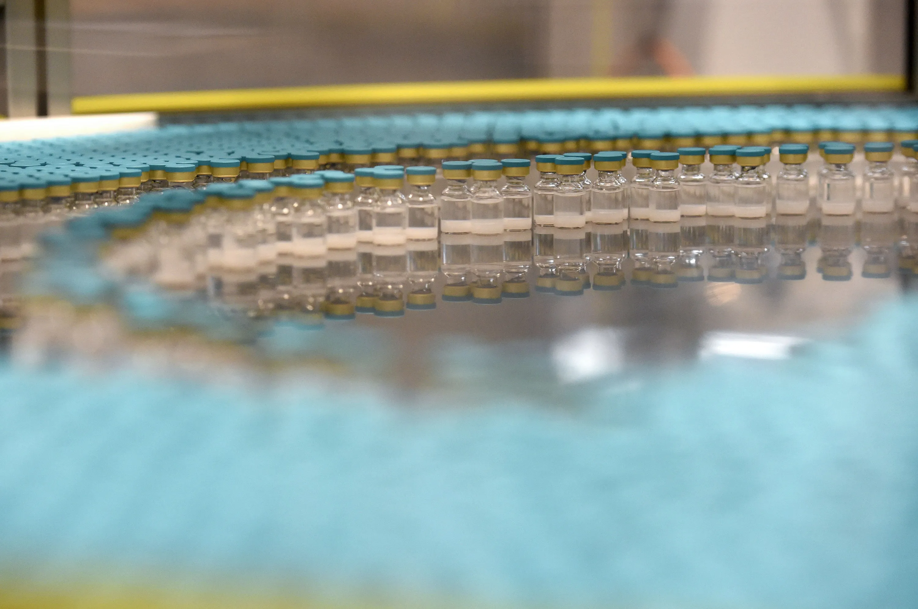 View of vials on a production line at the factory of British multinational pharmaceutical company GlaxoSmithKline&nbsp;in Saint-Amand-les-Eaux, northern France.