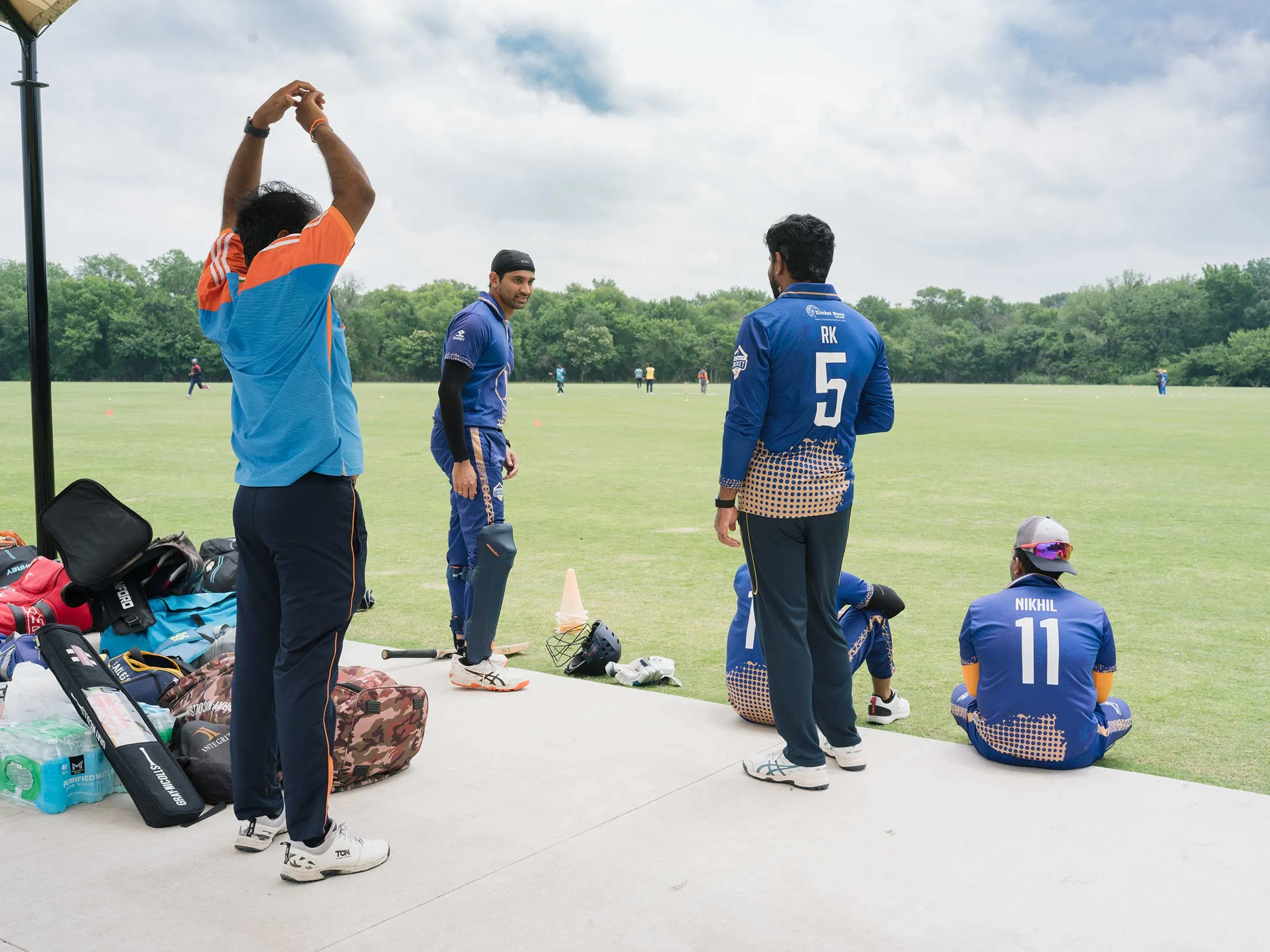 Players warming up before a cricket match in Allen, Texas