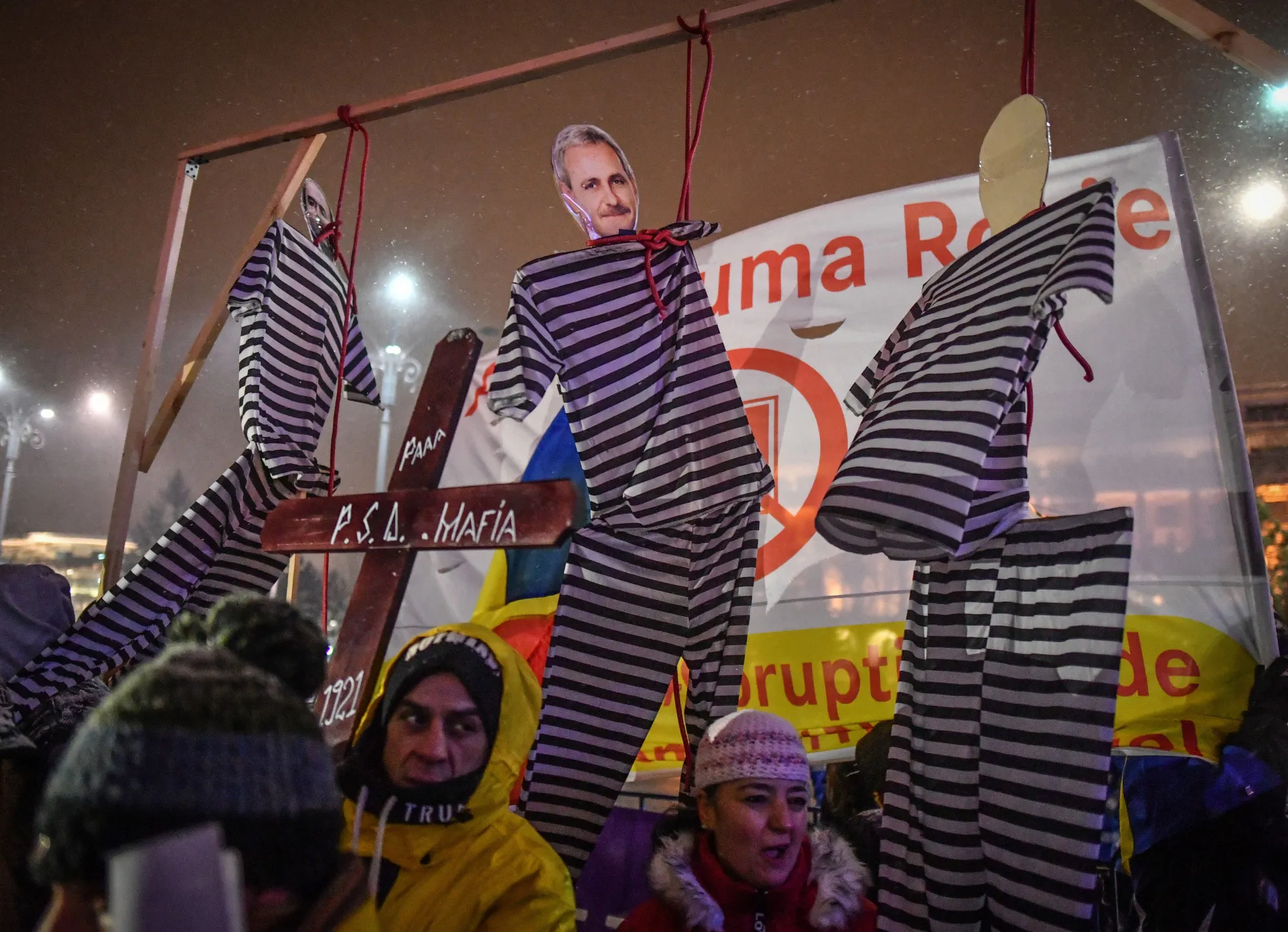 A cardboard cut-out depicting&nbsp;Liviu Dragnea is hanged during a protest against the justice minister and corruption in&nbsp;Bucharest on February 25, 2018.&nbsp;