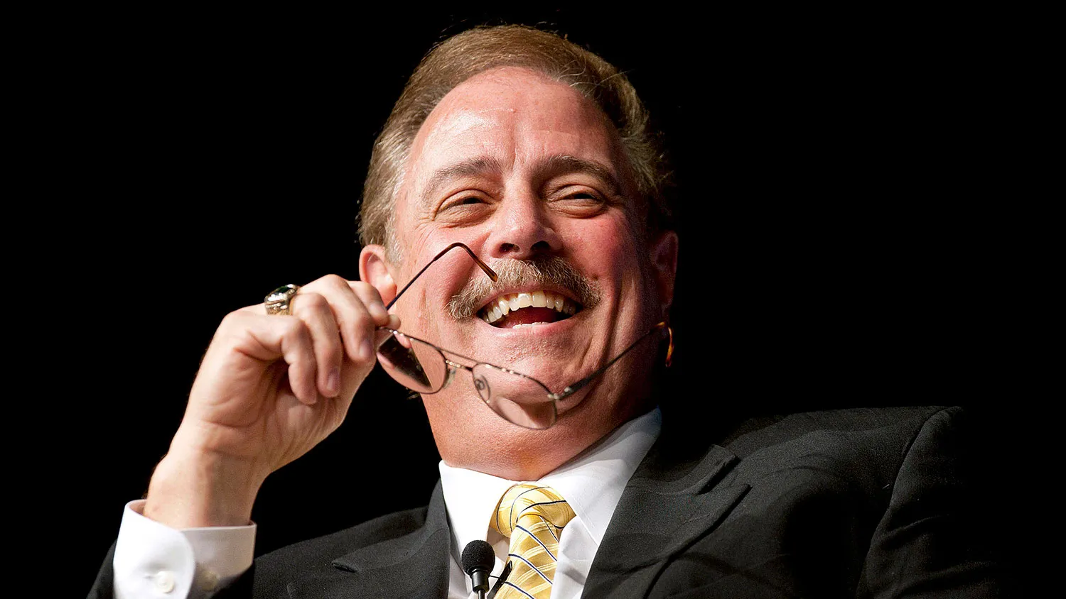 Dan DiMicco, chairman and president of Nucor Corp., laughs during a panel discussion at the Charlotte Chamber of Commerce's Economic Outlook Conference in Charlotte, North Carolina, on Dec. 6, 2010.
