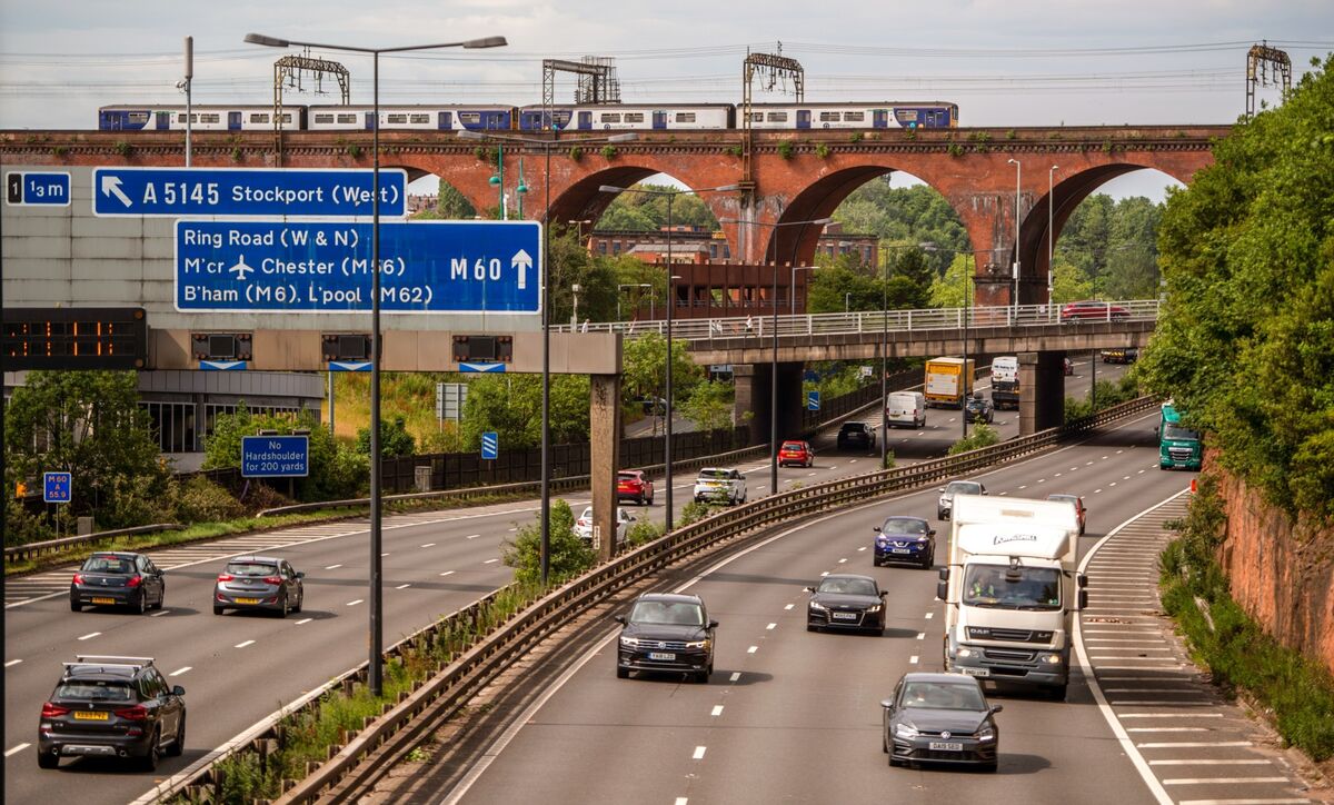 Traffic travels along the M60 motorway in the U.K., where a pilot project will soon be dropping speed limits. 