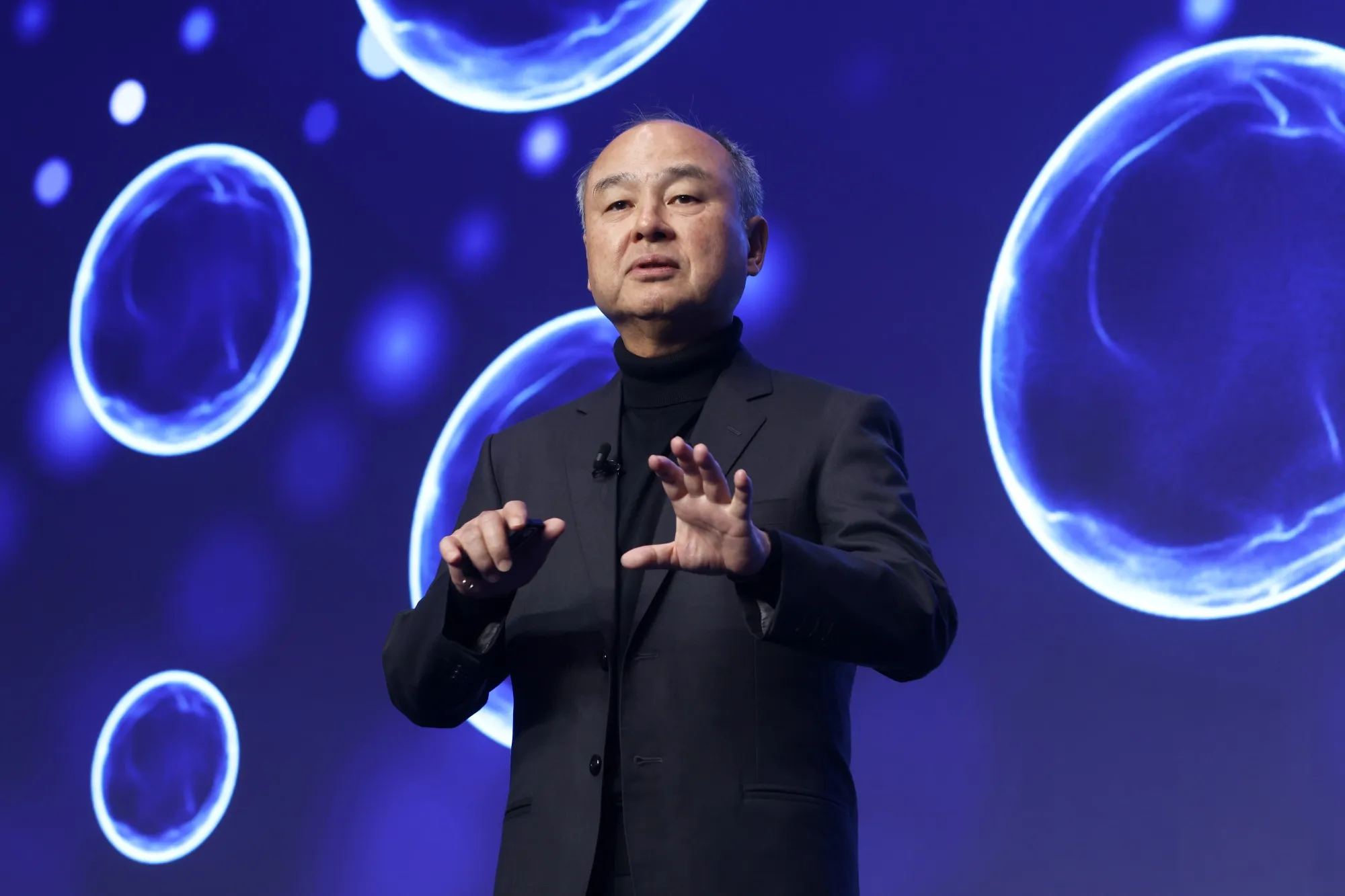 Masayoshi Son speaks at the SoftBank World event in Tokyo on July 16.