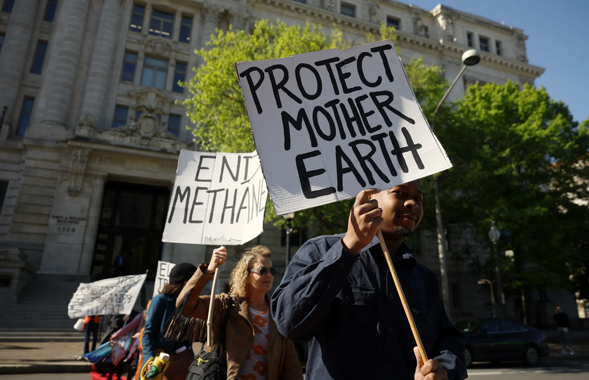 Members of the environmental activist group hold an Earth Day rally&nbsp;in Washington, DC, in 2024.