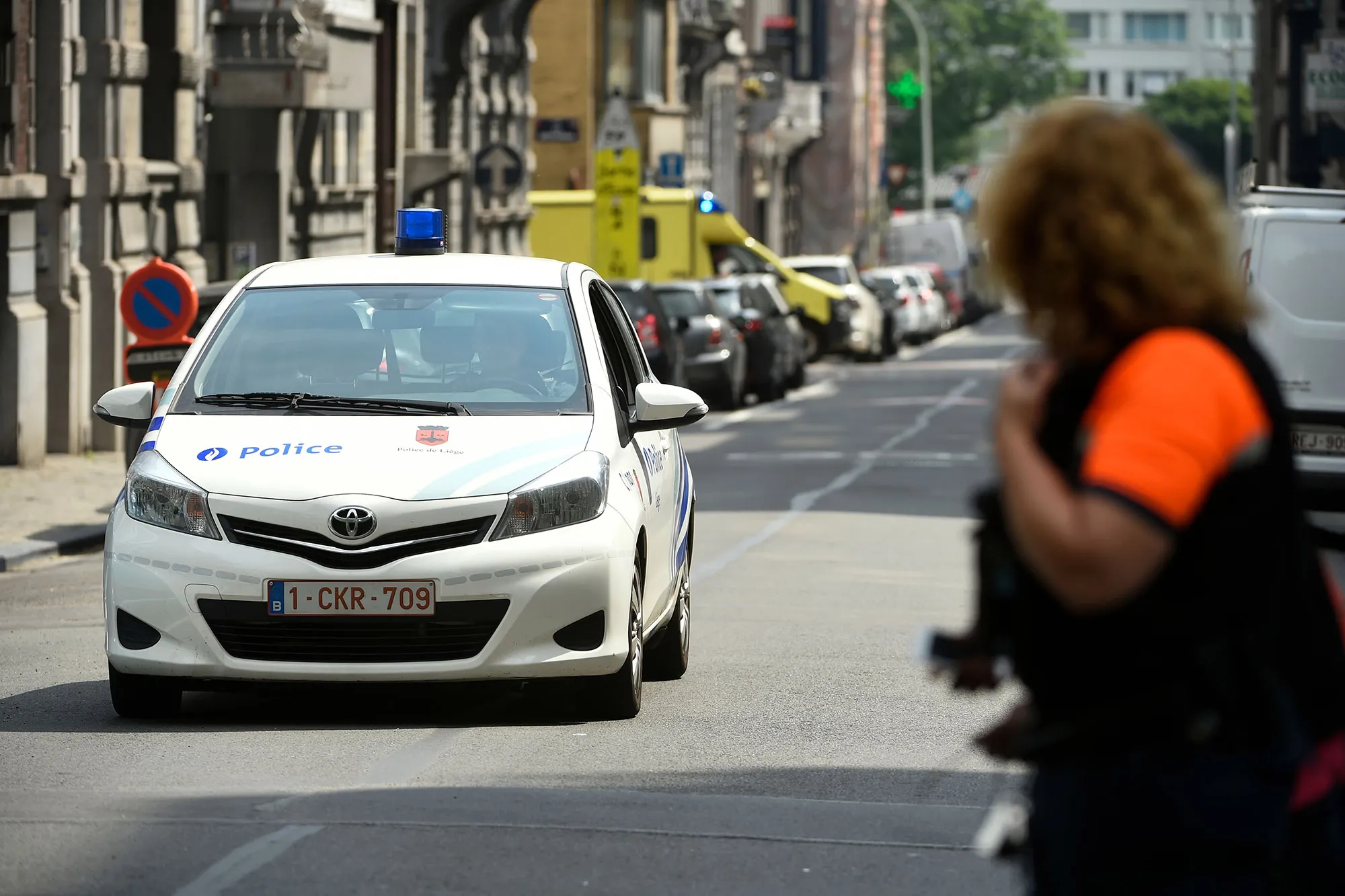 A police car drives in the eastern Belgian city of Liege after a shooting of two police officers and a bystander on May 29, 2018.