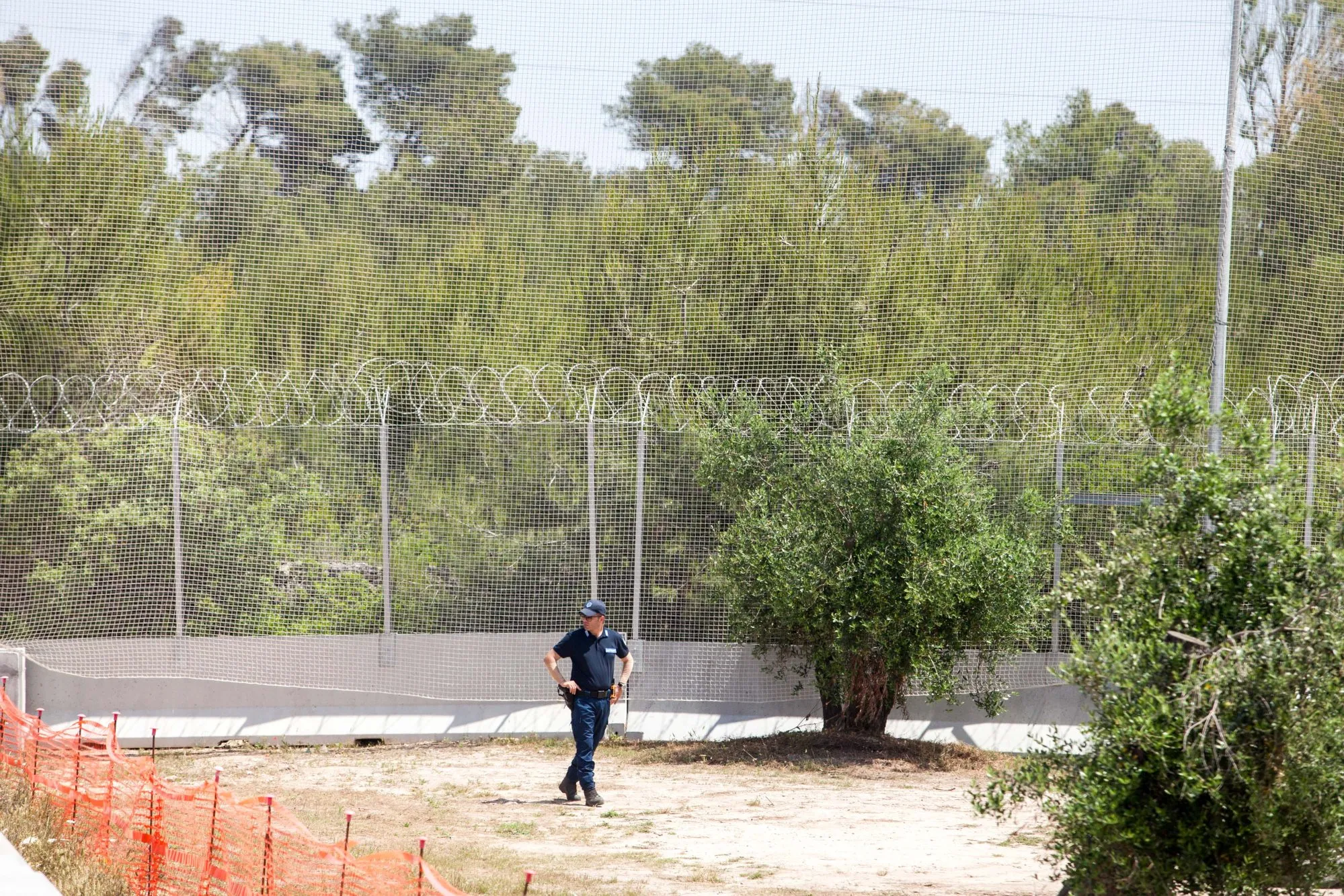A security service member patrols the&nbsp;Trans-Adriatic Pipeline worksite in&nbsp;Melendugno in the province of Lecce, Italy.